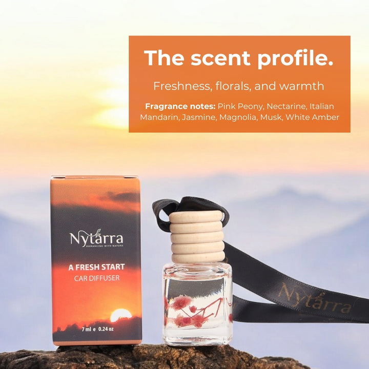 Nytarra "A Fresh Start" car diffuser featuring a blend of freshness, florals, and warmth with fragrance notes of pink peony, nectarine, Italian mandarin, jasmine, magnolia, musk, and white amber.
