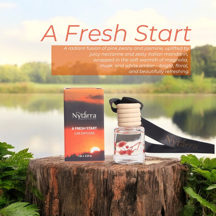 Nytarra A Fresh Start car diffuser with a floral-citrus scent, featuring a sleek wooden lid and elegant packaging for a refreshing aroma.