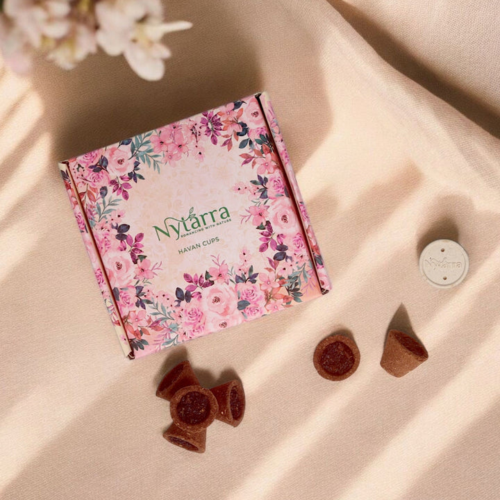 Nytarra Havan Cups in a floral box, made from natural ingredients for a pure, aromatic ritual experience. Comes with an easy-to-use holder.