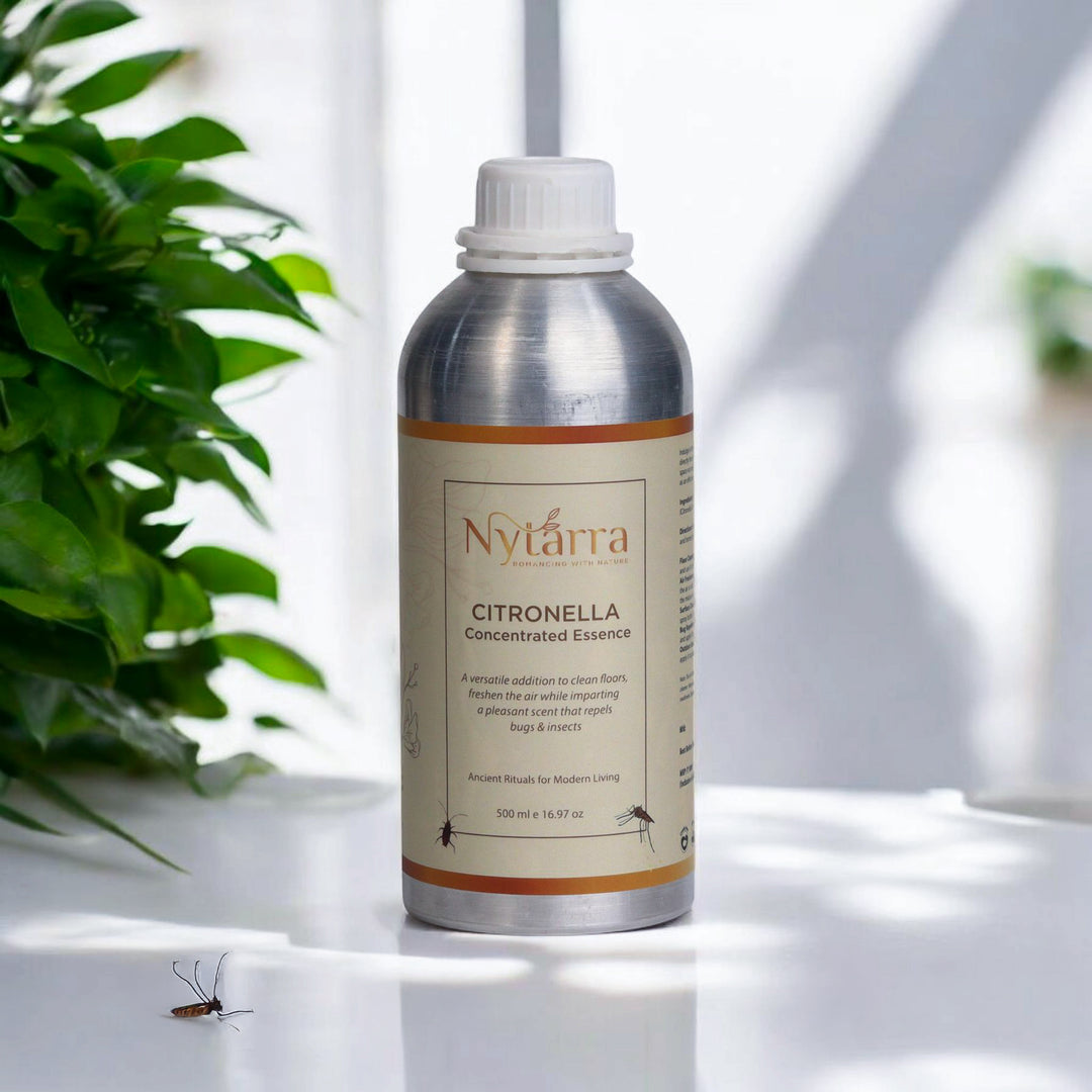 Nytarra Citronella Concentrated Essence in a silver bottle with a natural, eco-friendly label, placed on a white surface with plants.