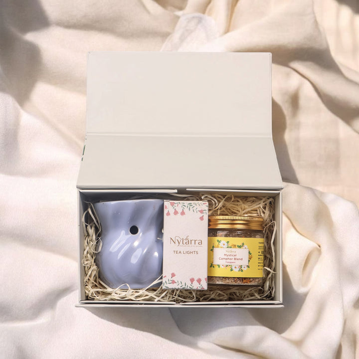 This gift set looks elegant and perfect for special occasions! The handcrafted ceramic diffuser, T-lights, and Nytarra Mystical Camphor Blend make it a thoughtful present. 
